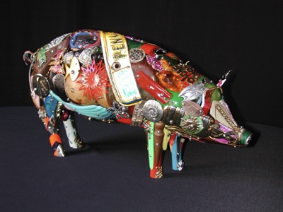 A pig sculpture assembled from hundreds of colorful found plastic and metal objects by Leo Sewell